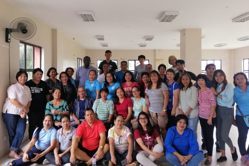 Mr. Oumar Sylla with leaders from the eight Barangays in Muntinlupa. Photo credit: UN-Habitat/Lunalyn Cagan