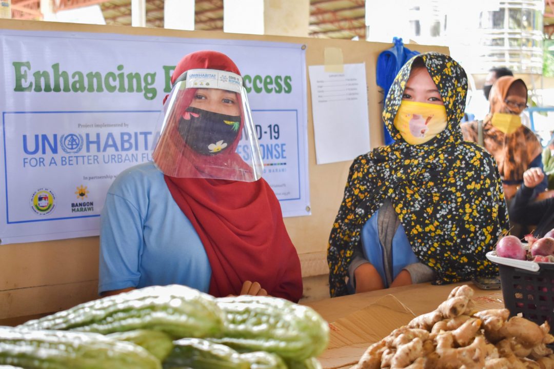 A youth in Marawi who serves as one of the frontliners in serving the mobile market in their area, project of UN Habitat Philippines (photo c/o of UN Habitat-Marawi Project)